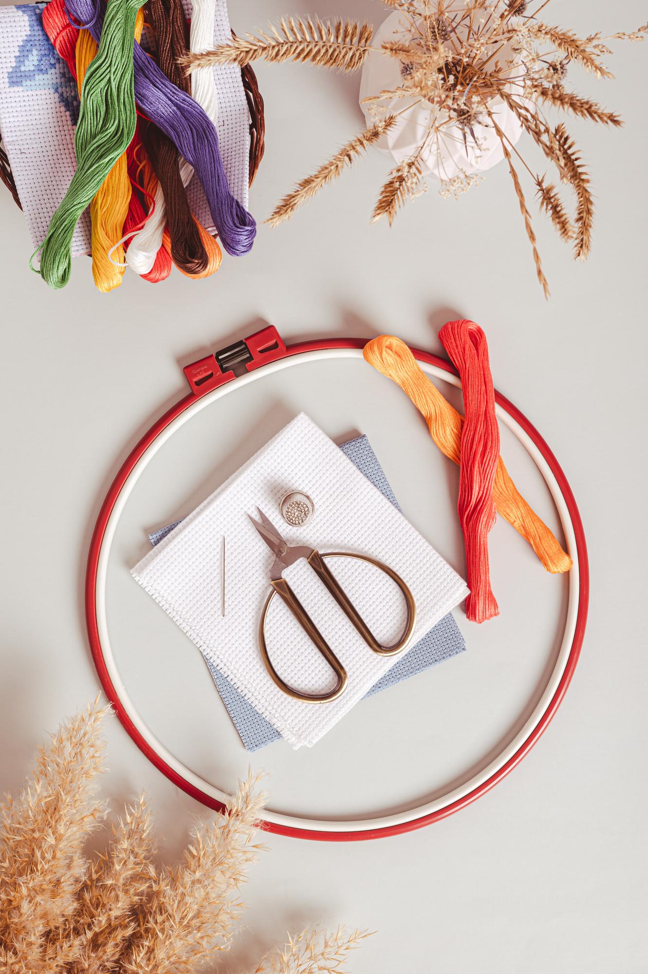 Selection of embroidered products laid out on a table